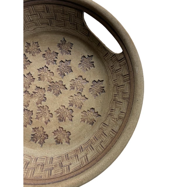 a signed vintage 1970s large ceramic studio art pottery bowl with handles this beautiful round shaped bowl has a unglazed...
