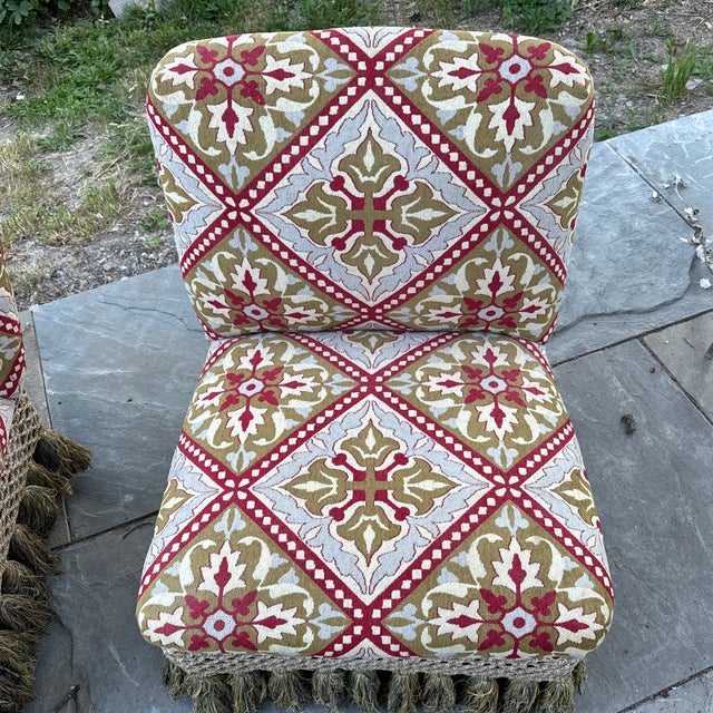 Napoleon the 3rd antique pair of tapestry slipper chairs. Very pretty silhouette and tapestry fabric.