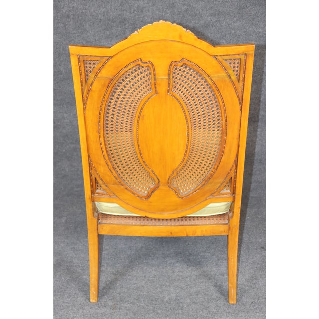 This elegant English Edwardian armchair, dating to circa 1890–1910, is a particularly decorative example of the period,...