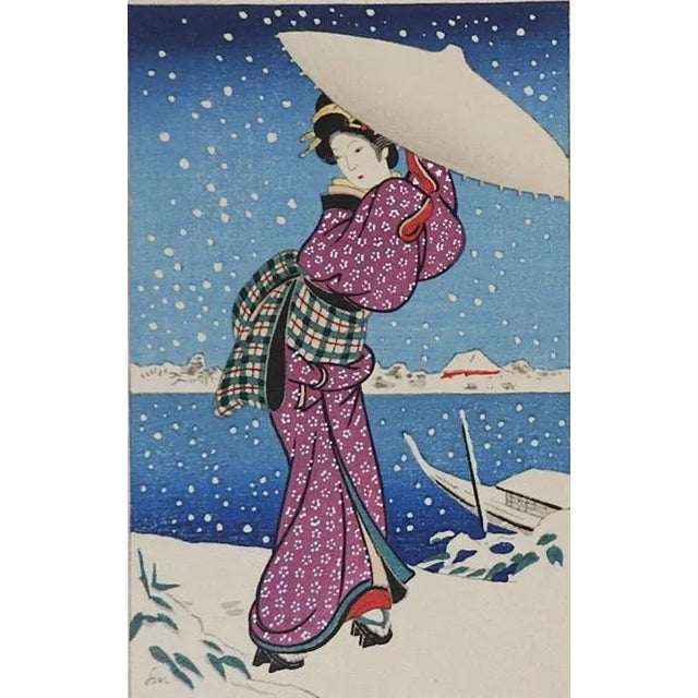 Pair of vintage miniature Japanese woodblock prints of versions of Maiko in the Snow. Tipped onto handmade paper for use...