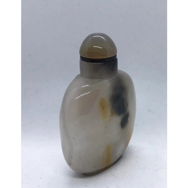 A floater is defined as a snuff bottle made of stone that is so light and hollowed out that it can float in water. Many...