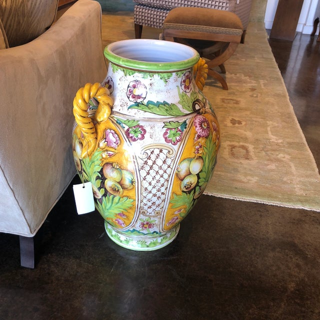 Large Handpainted ceramic urn with yellow handles. Italy