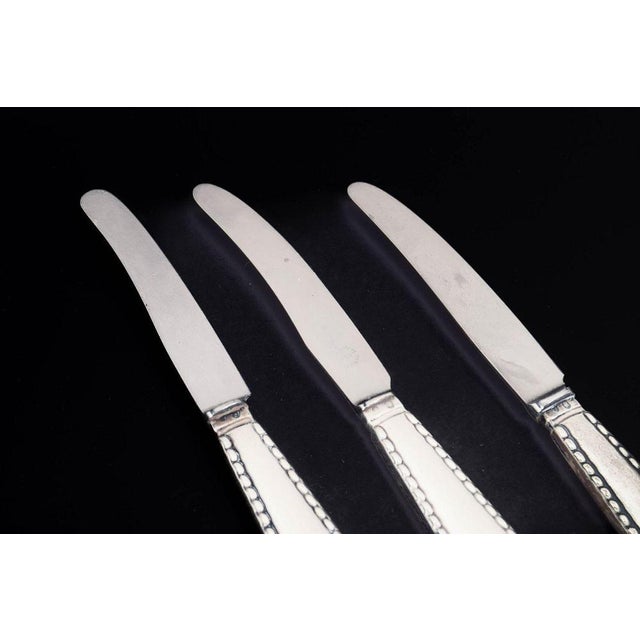 Georg Jensen, set of three knives Beaded. Set of three knives in stainless steel and 830 silver in the Beaded pattern from...