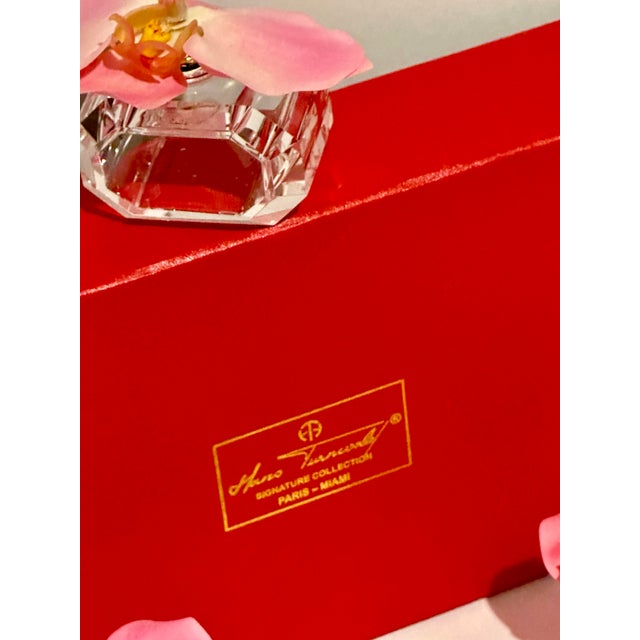 A set of 4 Napkin Rings by Hans Turnwald are Like Art for the Table. They are made of Heavy Crystal Rings and a High...