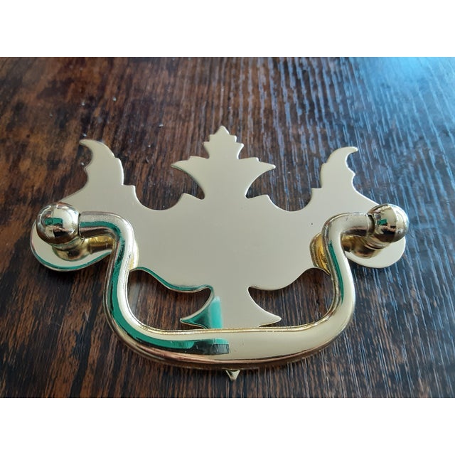 Purchased to designer inventory 1980s. In original package. Solid shiny gold brass. Includes 2 screws. 22 total, sold in 3...