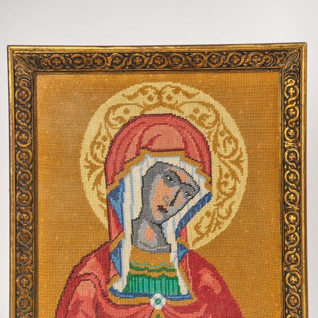 Incredible and unique hand stitched needlepoint artwork framed behind glass in a gold trimmed frame. Measures ~18.25" x...