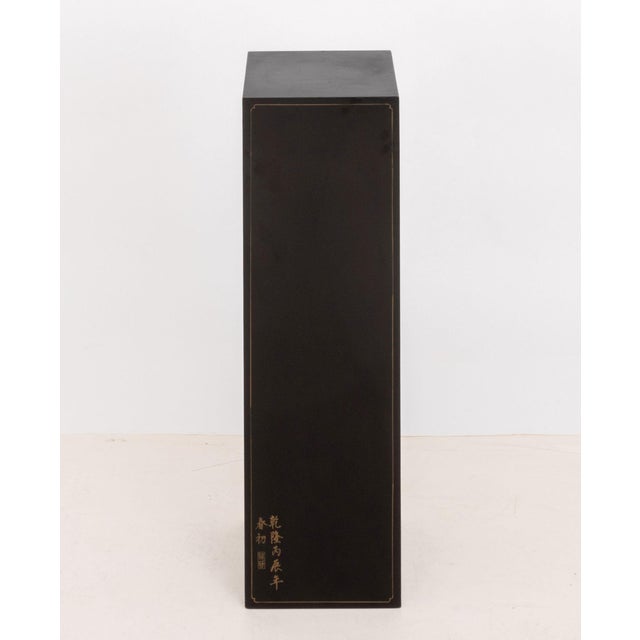 Maitland-Smith Chinese Ebonized Wood Pedestal, gilt calligraphy near base, paper label to underside. 36.25" H x 11.25" W x...
