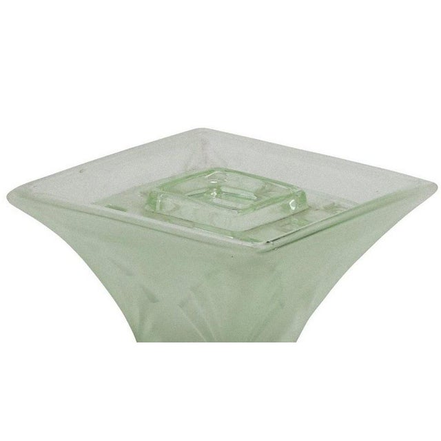 Vintage small vase is a beautiful vase realized by Italian Manufacture in the 1930s. Green sanded glass with base in black...