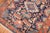 An early 20th century traditional navy blue field Persian Heriz carpet with a geometric all over design. Measures: 5'x...