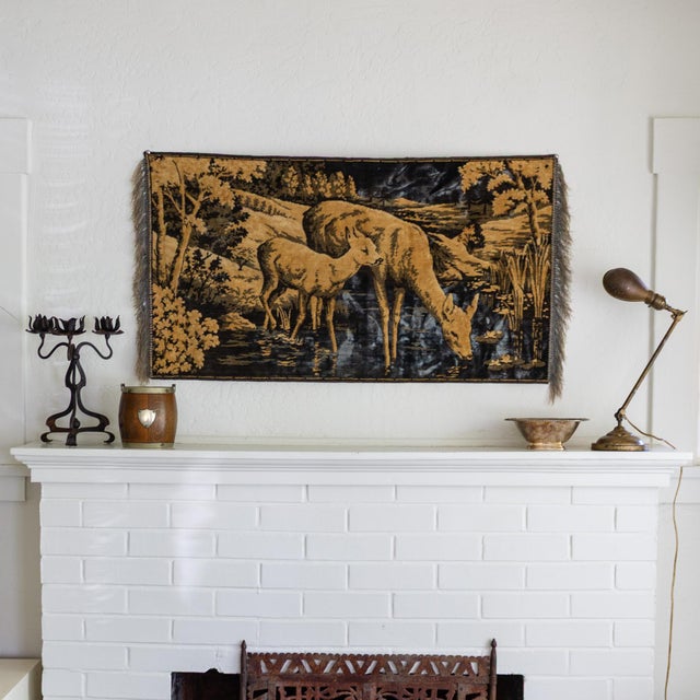 This vintage Belgian tapestry depicts taupe-colored deer on steely blue velvet, with fringe on each side. A linen tag...
