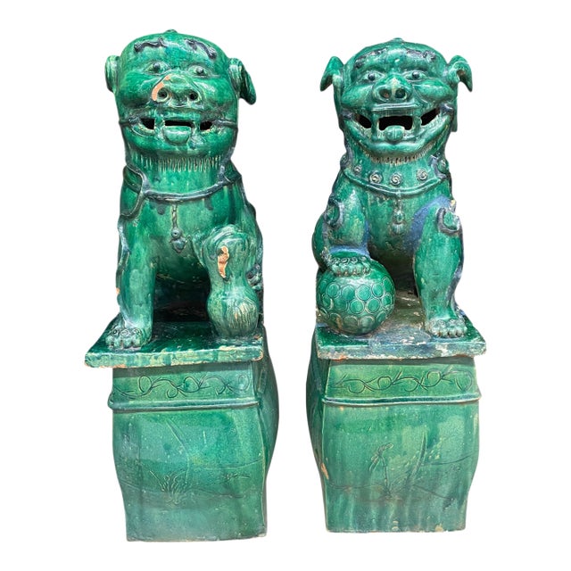 A Pair of Large Chinese Foo Dog Garden Statues in Green Glaze For Sale
