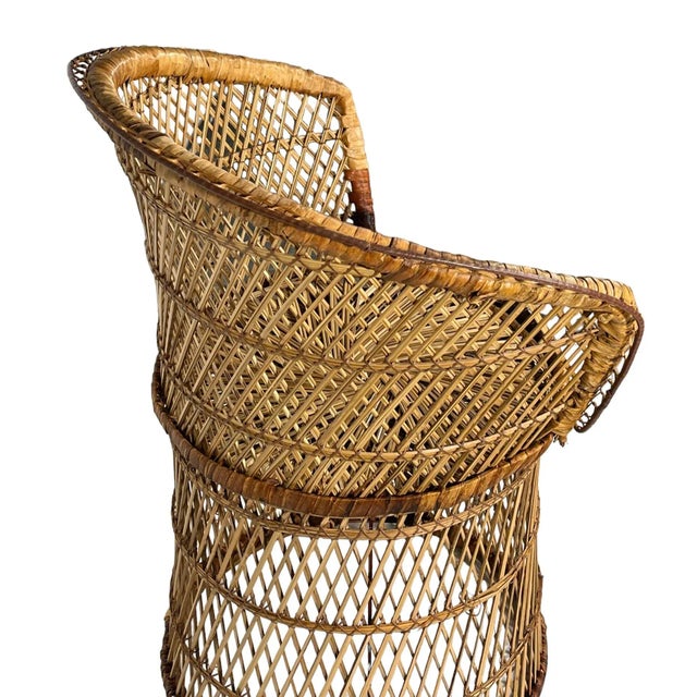 Groovy wicker side chair, circa 1970's from the Bohemian, Boho, Tiki, and Hippie schools of design, similar to the classic...