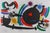 This original color print by Joan Miró exemplifies the artist’s celebrated visual vocabulary of bold black forms, vibrant...