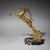 Pair of opposing bookends in brass with stylized leaping gazelles, mounted on dark marble plinths.
