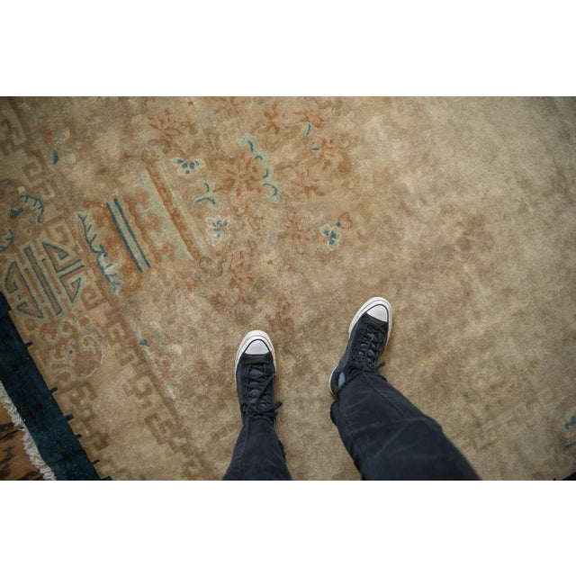 :: Tone-on-tone covered field in sprawling grape leave design motif with inwardly directed planters of germinating tree of...