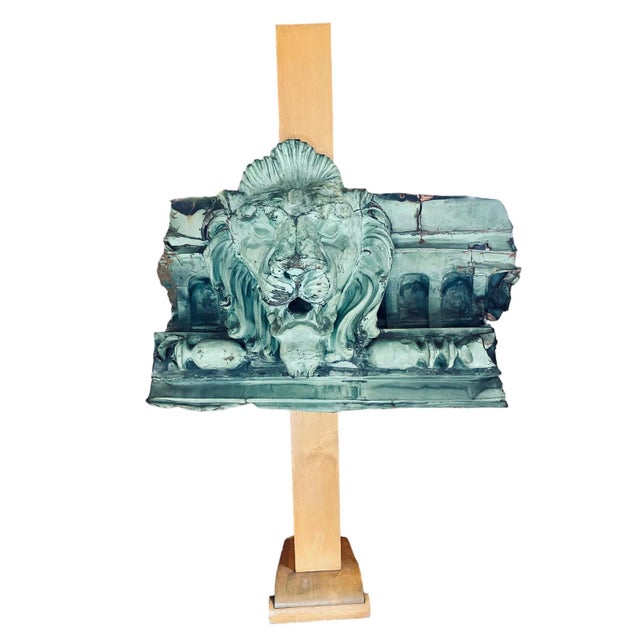 A large and remarkable lion bust architectural detail in repoussé copper with natural verdigris.