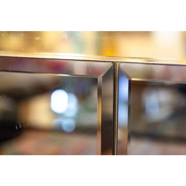 An Ello Furniture brass and beveled mirrors credenza sideboard. This is a spectacular piece with a bold Hollywood Regency...