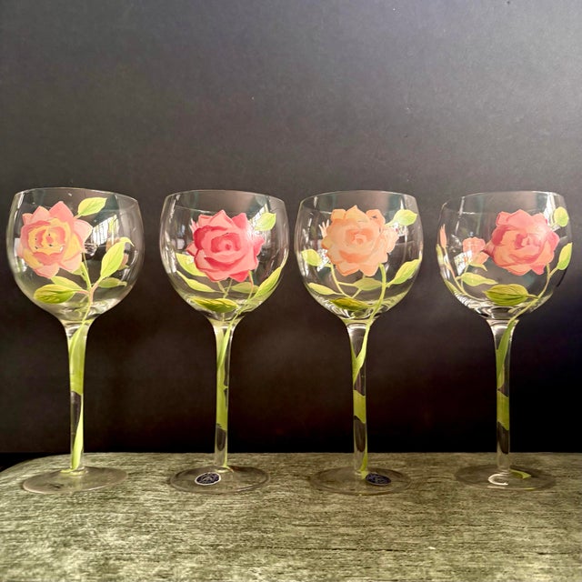 A charming set of four vintage balloon wine glasses by Block in their VIntage Rose Pattern. Decorated in a soft, hand-...