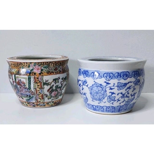 Elevate your home with this exquisite pair of vintage Chinese Famille Rose porcelain planter pots, embodying the timeless...