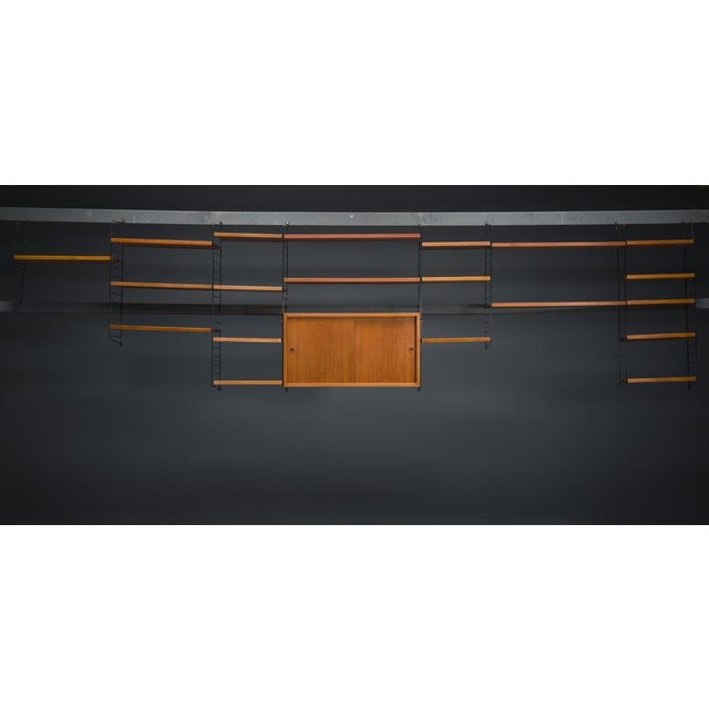 The bookcase is in very good condition, the shelves have been refreshed. Visible traces of use and a sign of time....