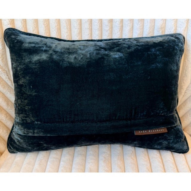 Made from silk, these pillows would be a unique addition to any room. Down inserts included. Anke Drechsel is a German...