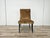 A 1950s-style single chair, ideal for a dining room or as a decorative element in hallways, living rooms, and other...