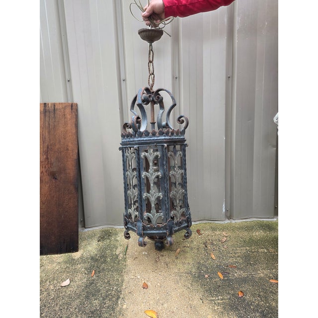 Wonderful antique iron lantern..thick partially cast Iron and hand wrought Mediterranean style lantern from Pasadena...