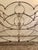 Antique Victorian Iron Bed This is an exquisite antique Victorian iron bed circa late 19th century. The king bed frame has...