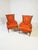 Pair of Louis XVI-style armchairs made in Italy in the 1960s. The armchairs are made of lacquered wood with an antiqued...