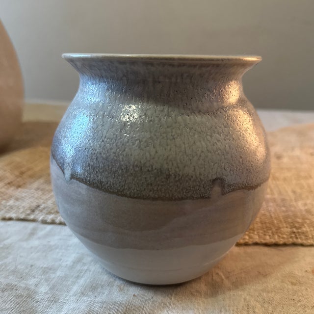 This vintage pottery piece captures the era’s fascination with organic form, expressive surface, and innovative glazing...