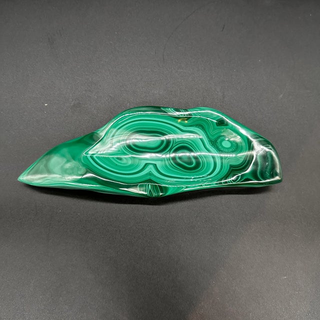 The Vintage Italian Malachite Ashtray from the 1960s is a stunning example of mid-century design and craftsmanship. Made...