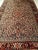 Vintage Persian Heriz in an allover pattern on an ivory color background with design colors in blue, green, red, navy, and...