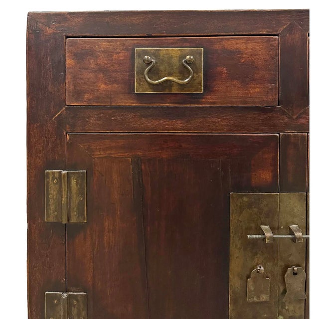 The piece of furniture for your consideration is a Chinese Ming-style cabinet or sideboard. It is known for their simple,...