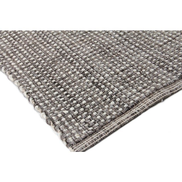 Bring some texture into any styled space with the Whitney rug. With its two-tone color weave and unique blend of wool and...