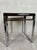 Vintage side table in chrome and smoked acrylic glass. Designed by Marc Berthier. Height: 41 cm. Width: 38 cm. Depth: 32...