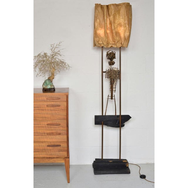This extraordinary and unique abstract standard lamp in copper, wood and cotton cloth is by renowned British artist David...