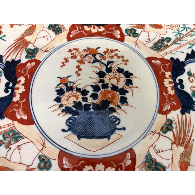 An excellent late 19th century Meiji period Imari porcelain charger. Of large size and good quality. with hand painted...