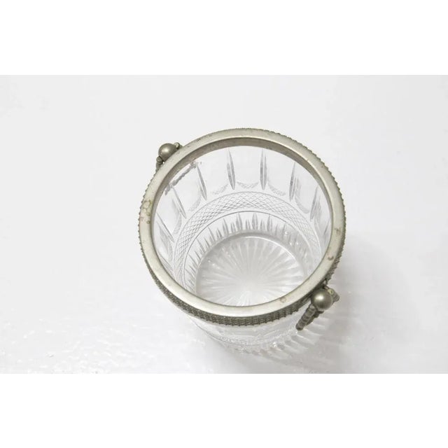 Beautiful round shaped beverage or wine basket produced in the 1950s by Baccarat, fine glassware. The basket has a...