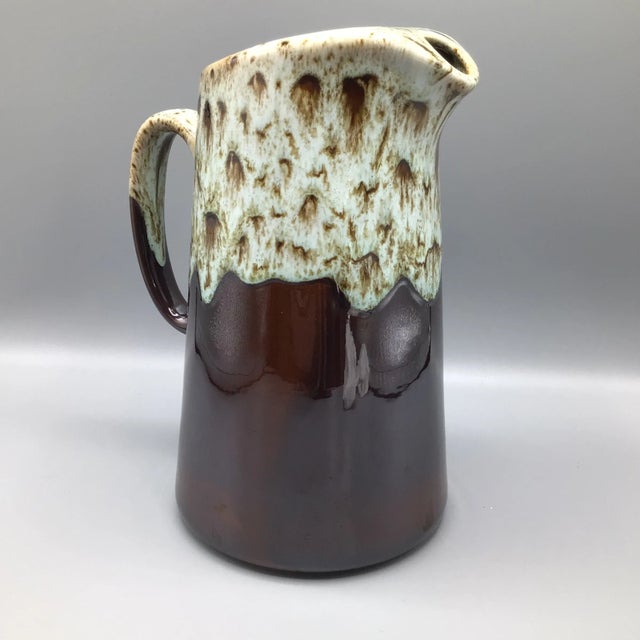 Brown drip glaze ironstone pitcher in excellent condition.