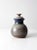 his is a signed studio pottery jar dated 1978. The hand-crafted ceramic vessel features a speckled gray glaze with blue...