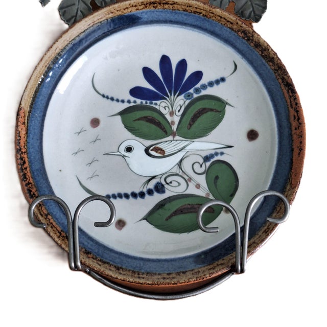 This exquisite Ken Edwards plate features a hand-painted bird and floral design, perfect for adding a touch of Mexican...