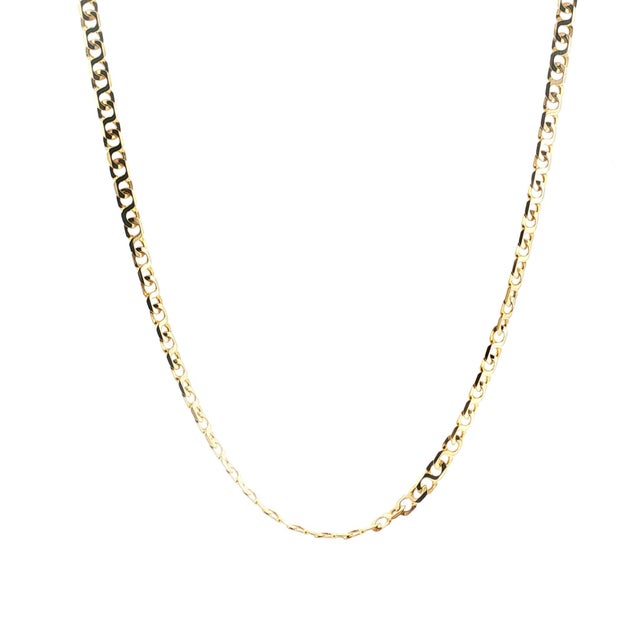 A late 20th-century 14k gold solid link necklace from Italy. Features a sleek, interlocking design. Weighs 25 grams....