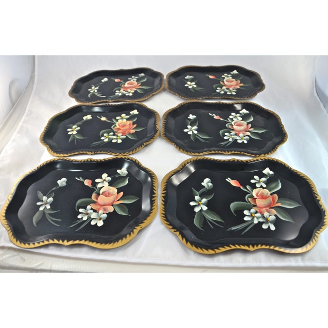 Six hand-painted Tole metal trays serve up a touch of spring when presented with tasty snack or appetizers. The...