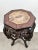 Elegant antique Oriental Chinese rosewood fern stand, showcasing exceptional hand carved craftsmanship. The octagonal top...
