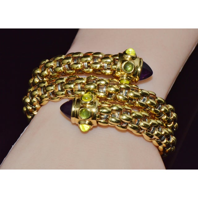 Authentic vintage FOPE solid 18K gold double wrap twist snake bracelet featuring gorgeous amethyst and peridot cabochons....