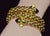Authentic vintage FOPE solid 18K gold double wrap twist snake bracelet featuring gorgeous amethyst and peridot cabochons....