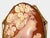 This beautiful piece is an authentic Victorian shell cameo configured to function as both a brooch pin and a pendant. It...
