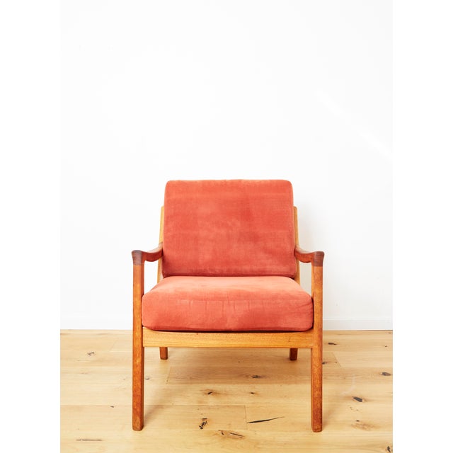 Condition: Upholstered in red fabric. Teak frame. Good condition with age-appropriate signs of wear. This piece has an...