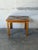 This square coffee table features a clean-lined profile with an inset grid surface. Nine ceramic tiles create a striking...