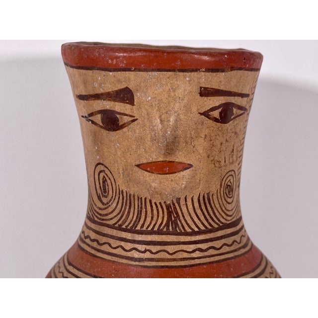 Mexican Folk Art Guerrero Nahua Figural Vase for your consideration. The vase measures approx. 8 inches tall and approx. 3...